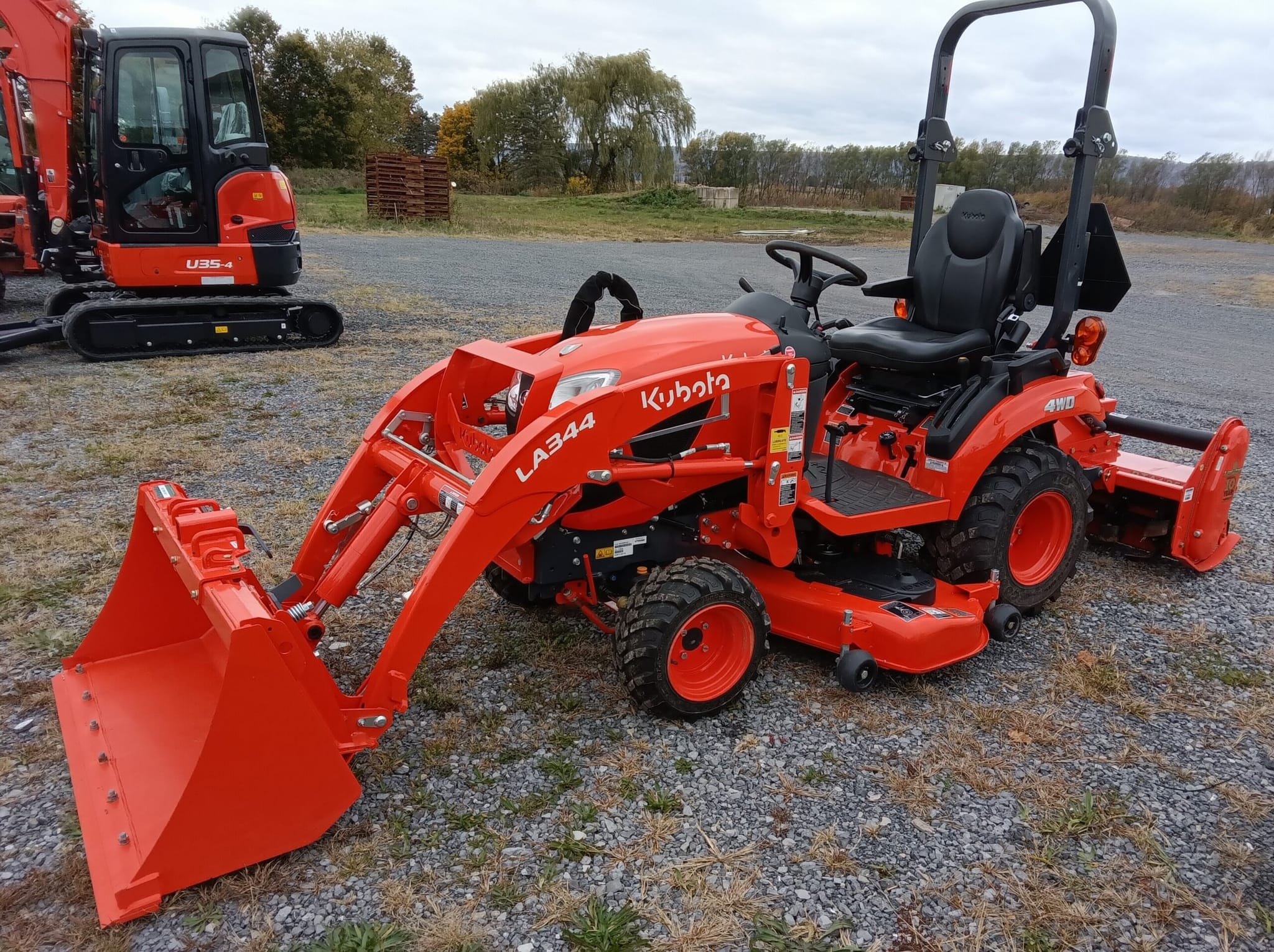 USED 2024 KUBOTA BX2380R14V-1 W/FRONT LOADER/54″ MOWER DECK & 50″ REAR TILLER – STATE COLLEGE